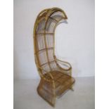 A vintage bamboo chair of elongated egg form