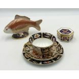 A small collection of Royal Crown Derby including an Imari pattern trio and trinket box along with a