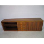 A sectional mid century cabinet from London offices of Barclays Bank, comprises of set of four