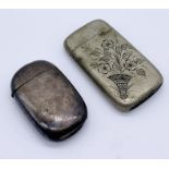 A hallmarked silver vesta case along with one other