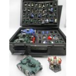 A collection of Warhammer figures and vehicles etc.