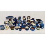 A large collection of mainly blue Torquay ware including a number of kingfisher design pieces