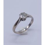 A diamond solitaire ring measuring 0.5ct set in 18ct white gold