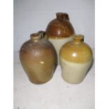 Three large antique stone ware jugs, one named to Samuel Bennett, Bridport, another to Conway &