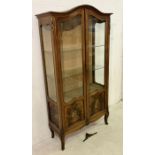 A 19th Century French Vitrine with painted panels to lower portions of doors, signed Albertini.