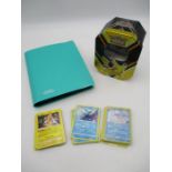 A full original base set of 102 Pokémon cards, along with a selection of modern loose Pokémon