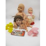 An assortment of vintage dolls and heads (some A/F), also includes a childrens tea set and a