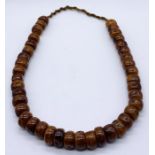 An antique amber necklace weight 165g