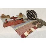 A collection of items including small woven rug, Morgan & Sons set of scales with weights, ships
