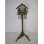 A wooden bird table