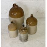 A collection of stoneware flagons including Thomas Jackson & Co Exeter, Maber & Parker