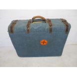 A vintage Flying Luggage (London) suitcase in canvas cover