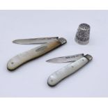Two hallmarked silver fruit knives along with a silver thimble