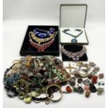 A large collection of costume jewellery including a number of large necklaces, rings, brooches etc.