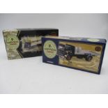 Two limited edition boxed Guinness die cast models. A Bedford TK 4 Wheel platform lorry with barrels