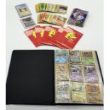 A collection of various Pokémon cards including a CGC graded Pikachu, 25th Anniversary Umbreon,