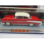 A collection of sixteen boxed Matchbox, the Dinky collection including 1964 Mini Cooper S, 1973