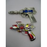 Two silver coloured toy space guns