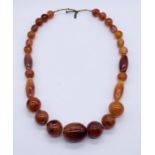 An amber (tested) necklace, weight 70.6g