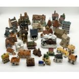 A collection of ceramic houses, buildings etc.