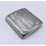 A hallmarked silver curved cigarette case, weight 66.8g