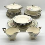 An Art Deco Burleigh Ware part dinner set including dinner plates, terrines, side plates etc.