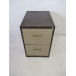 A vintage two drawer filing cabinet