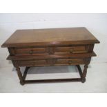 A small oak sideboard with three drawers