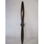 A reproduction wooden propeller blade by Authentic Models - overall length approx. 187cm