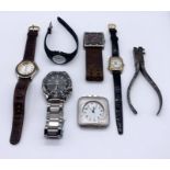 A collection of various watches along with a Hugoniot Tissot watch makers tool