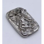 A Sterling silver vesta case with embossed fairy on a foliate background