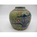 An antique Chinese ginger jar depicting five claw dragons, butterflies etc.