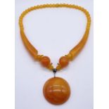 An amber coloured necklace