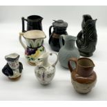 A collection of vintage and antique jugs