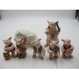 A collection of pigs in the form of musicians, plus a pig with a German iron cross and a