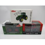 A collection of three boxed die-cast models of tractors (1:32 scale) including a limited edition