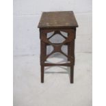 An Arts & Crafts wooden stool