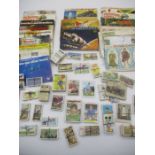 A large collection of Brooke Bond picture card albums and loose cards. Full albums include The sea
