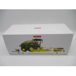 A boxed Wiking John Deere 8500i forage harvester die-cast model with corn header, pick-up unit and