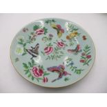 A 19th Century Famille Rose plate decorated with flowers and butterflies, character mark to base,