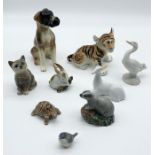 A small collection of ceramic animals including Beswick, Royal Doulton, Lladro, Wade, USSR tiger