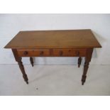 An Edwardian mahogany hall table with two drawers