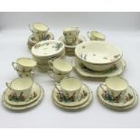 A Crown Staffordshire part tea service including 12 trios, two sandwich plates, 12 small bowls and 2