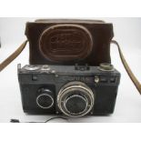 A Zeiss Ikon Contax If Rangefinder Camera along with a Zeiss Ikon "Avo" exposure meter