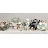 A collection of antique china including a number of cups and saucers, six monogrammed plates, Arthur