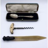 A hallmarked silver Christening spoon in case along with a bone handled corkscrew and a horn