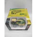 A boxed Krone Big X 1180 forage harvester die-cast model (1:32 scale) with maize and grass headers