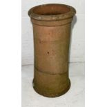 A vintage terracotta chimney pot