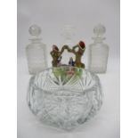 Three cut glass decanters, a cut glass fruit bowl along with a Staffordshire flatback