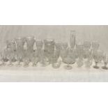 A collection of assorted cut glass and others including goblets, tumbler, jugs etc